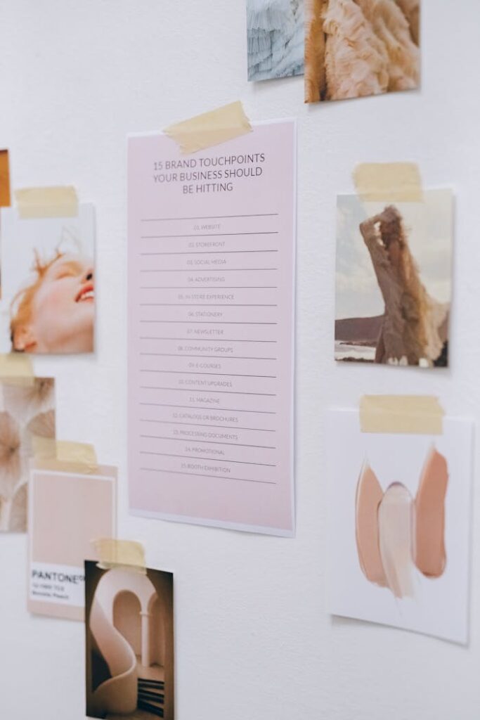 Mastering the First Impression: Your intriguing post title goes here A creative mood board with business touchpoints and inspirational images taped to a white wall.